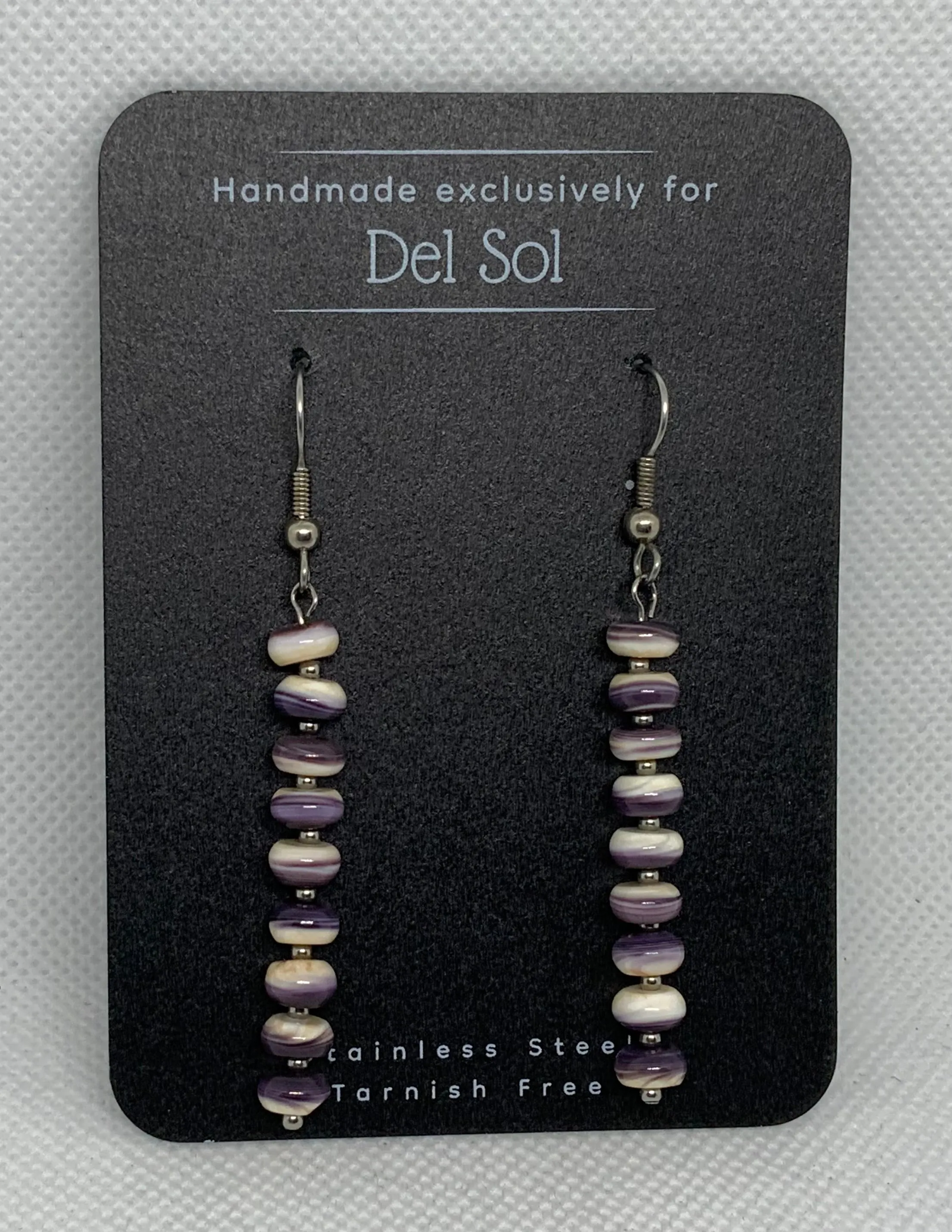 Genuine Quahog (Wampum) shell earrings with hypoallergenic stainless steel beads and ear wires.  EP133