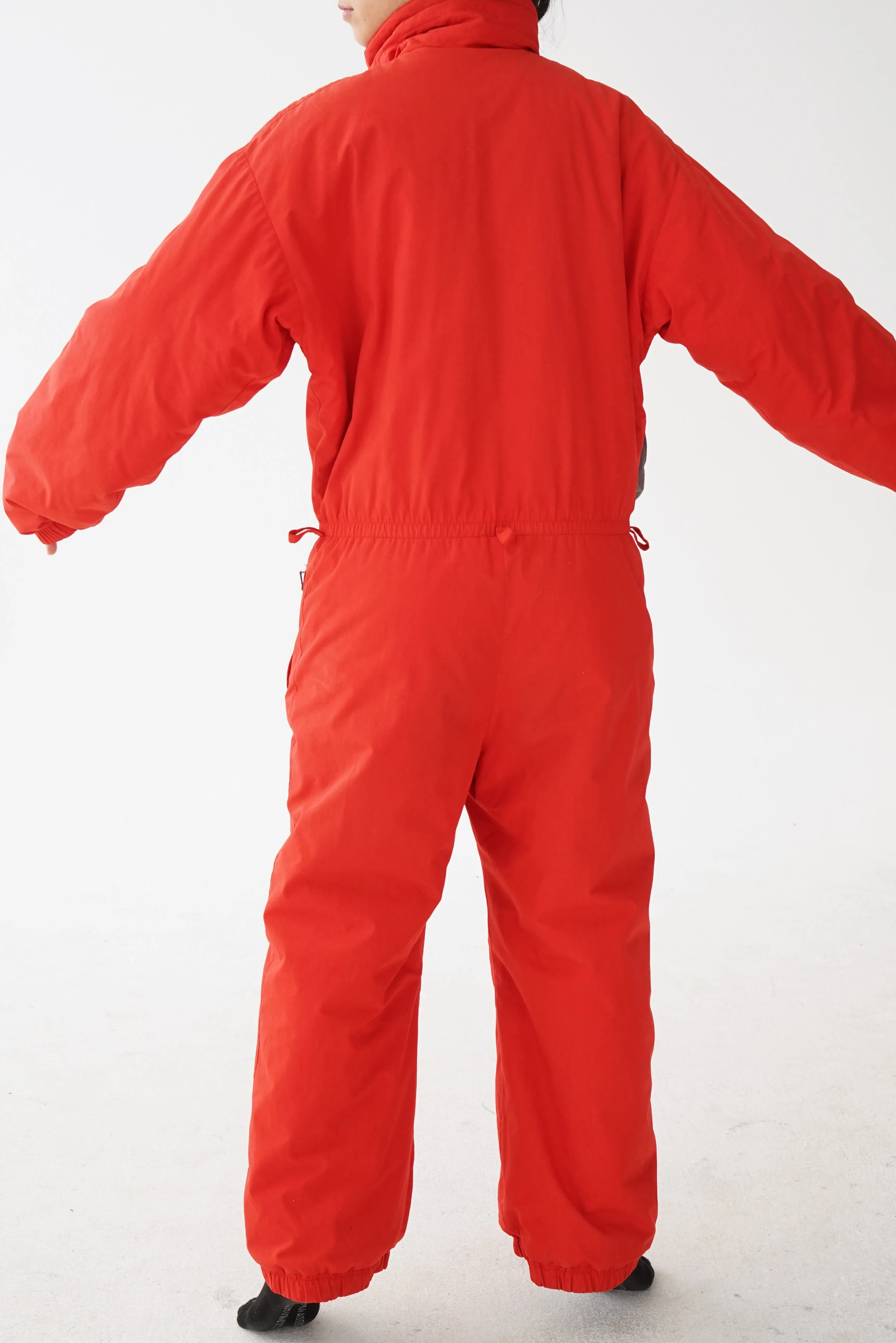 One piece Skiss ski suit, snow suit rouge pour homme taille L-XL